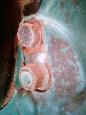 Adjustment nut welded